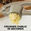 High quality garlic press with soft easy squeeze ergonomic handle, sturdy design extracts more cloves per clove, garlic crusher for nuts and seeds